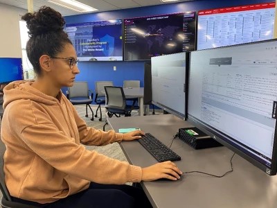 MassBay Community College student at cyber range computer